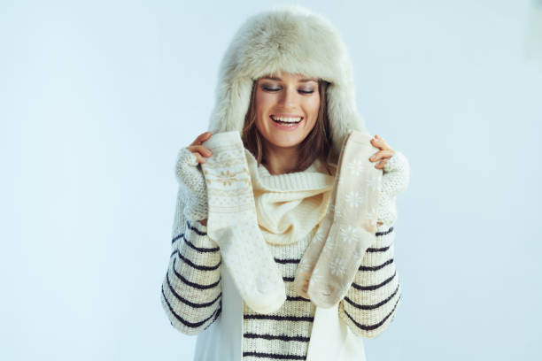 istock happy trendy female showing winter socks 1202457702