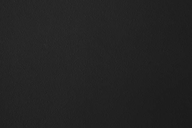 istock Dark black stone wall with rustic natural texture for abstract background texture and design purpose 1202461294