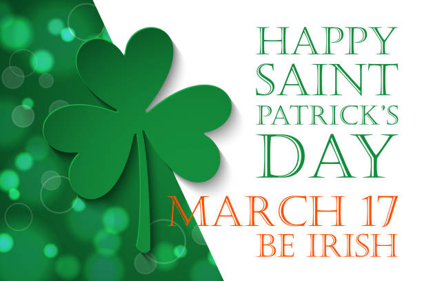 istock Happy Saint Patrick's Day holiday banner with green clover. March 17. Be Irish. 1202461523