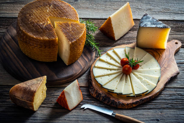 istock Manchego cheese from Spain on wood table 1202461644
