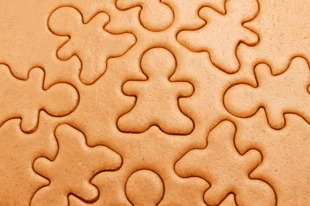 Gingerbread cookies background. Closeup of Christmas dough cookies