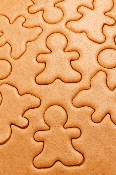 Gingerbread cookies background. Christmas dough baking pattern