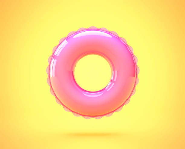 Pink inflatable swimming ring isolated on yellow Pink inflatable swimming ring isolated on yellow background. 3D rendering with clipping path inflatable ring stock pictures, royalty-free photos & images