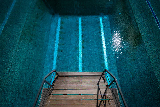 istock diving tower in a swimming pool from above, Germany 1202464867