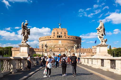 Rome, Italy - October, 2019: Castel Sant'Angelo and the Sant'Angelo bridge during sunny day in Rome, Italy.