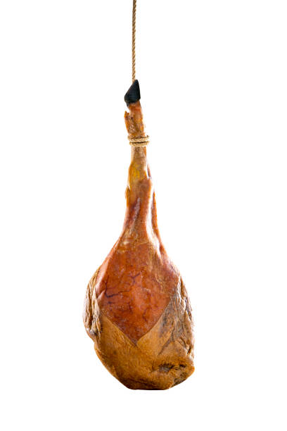 Iberian ham Iberic ham leg hanged black hoof whole jamon iberico isolated on white