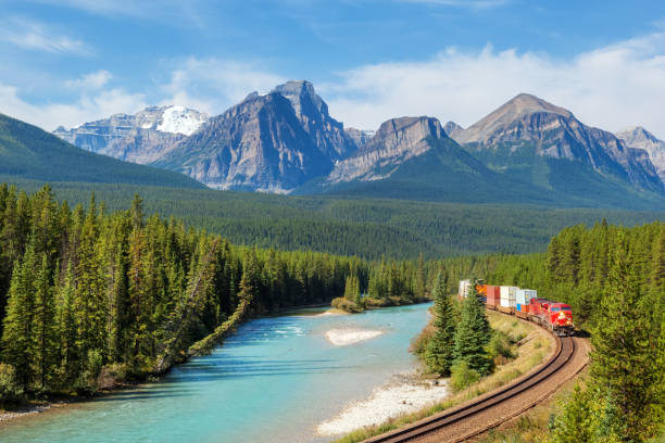 Freight train in the mountains stock photo