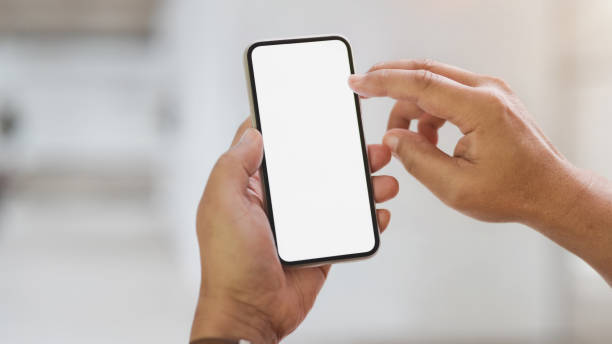 istock Cropped shot of a man using blank screen smartphone 1202467108