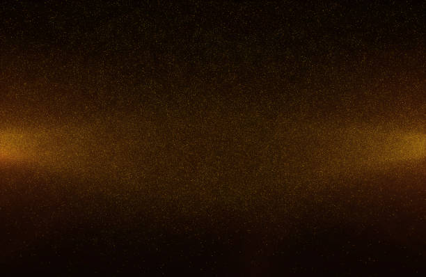istock Abstract bokeh glitter lights background of flickering gold particles and light flare 1202469021