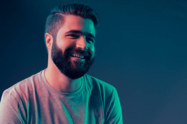 istock Neon portrait of a young attractive man 1202469427