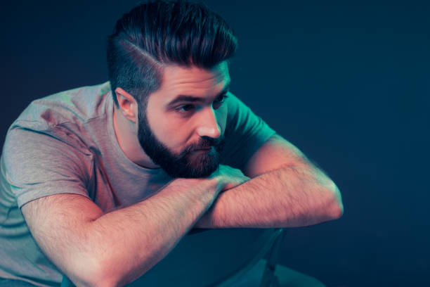 istock Neon portrait of a young attractive man 1202469461