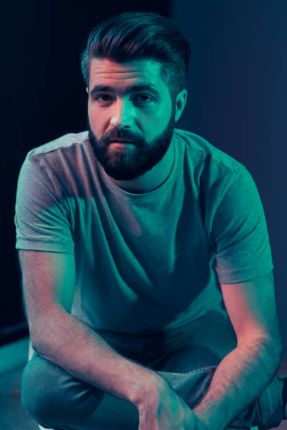 istock Neon portrait of a young attractive man 1202469463
