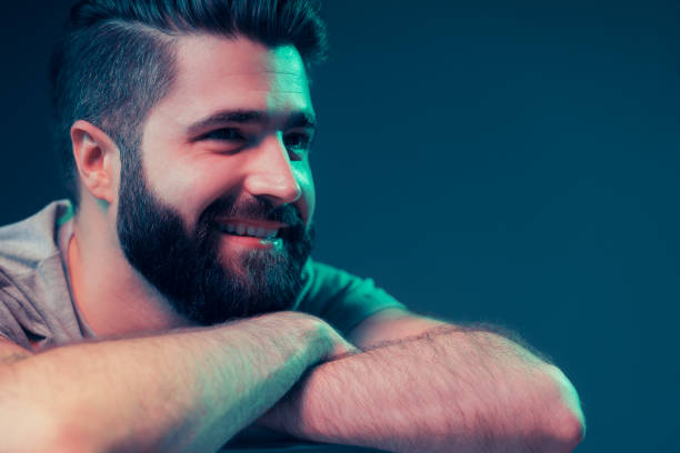 istock Neon portrait of a young attractive man 1202469471