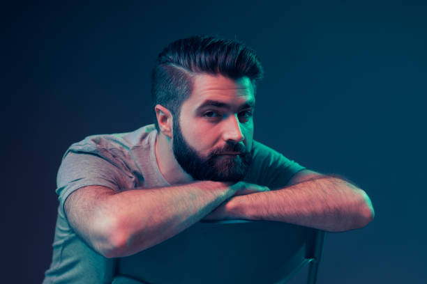 istock Neon portrait of a young attractive man 1202469475