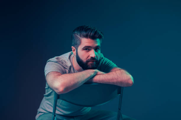 istock Neon portrait of a young attractive man 1202469494