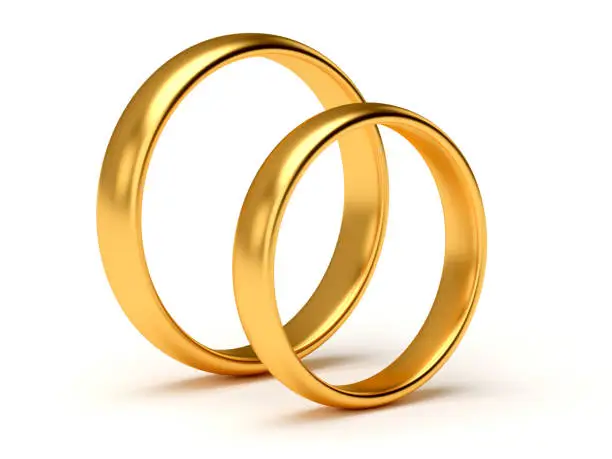 Illustration of two wedding gold rings lie near isolated on white background. 3d rendering