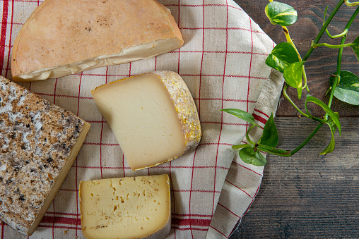 cheeses and Tomme de Savoie, French cheese Savoy,a french Alps France.