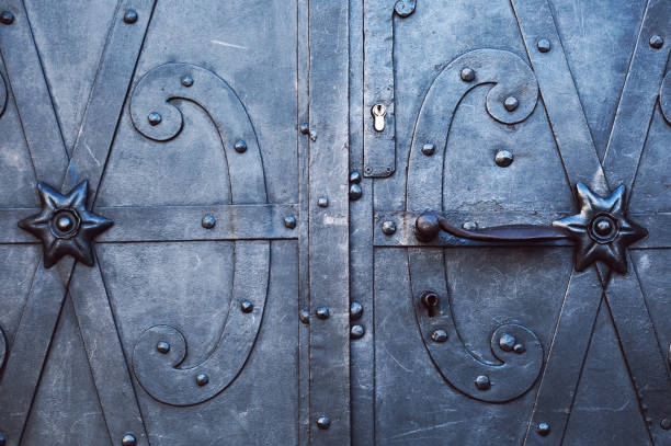 istock old metal door with cast patterns detail 1202472065