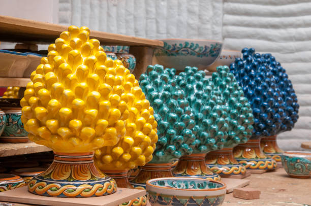 Colored pine cones in the workshop of a pottery artisan in Caltagirone, Sicily