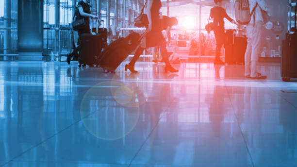 istock People Commuter Walking Rush Hour in the airport 1202480963