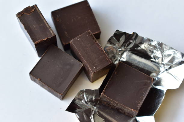 istock Chocolate cubes of bitter and milk chocolate 1202482241