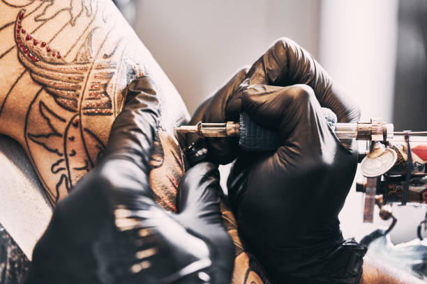 istock Tattooing a shoulder. Close-up shot 1202483406