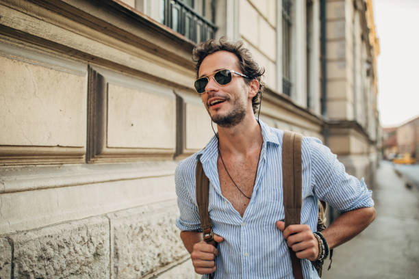 istock One man walking in the city 1202483843