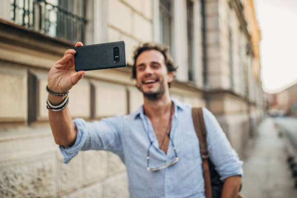 istock One man making selfie in the city 1202484047