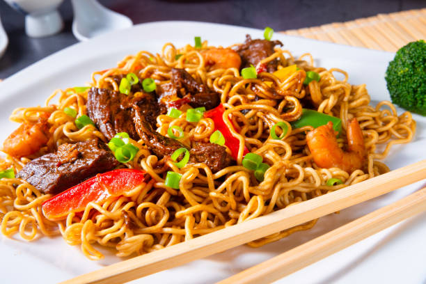 istock Fried Mie noodles with beef and vegetables. 1202484108