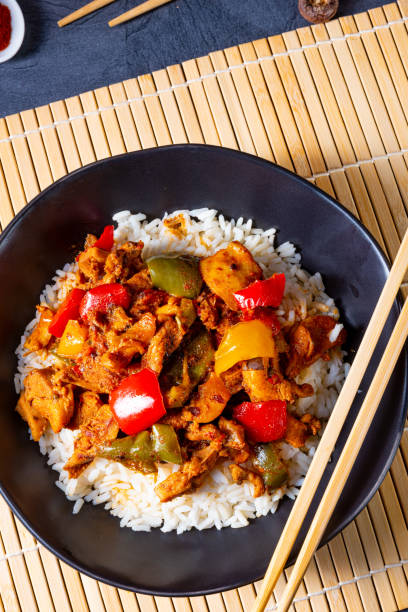 istock Hot roasted chicken with rice and vegetables 1202484167