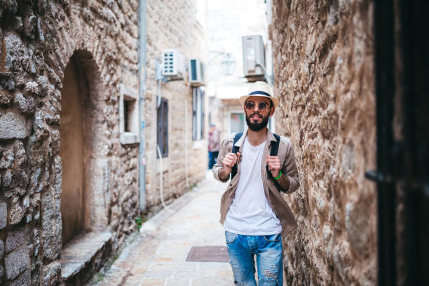 istock Tourist man on holiday in Budva 1202484262