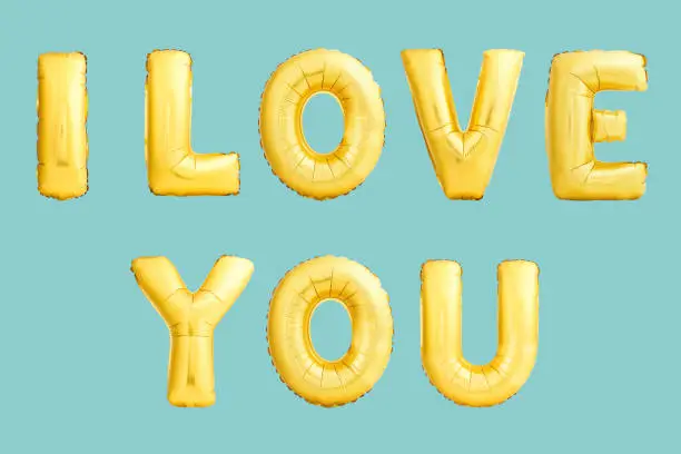 I love you sign. Golden helium balloons on blue