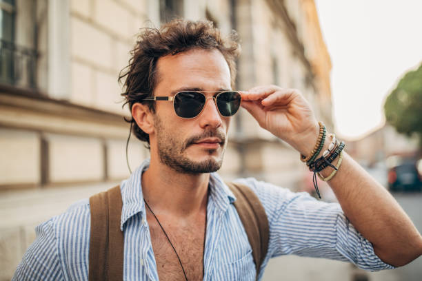 istock One hipster man standing on the street 1202485060
