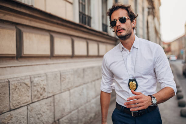 istock Detective walking on the street 1202485305