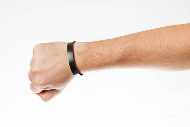 istock Security black rubber bracelet mockup. Paper branding wristband 1202487309