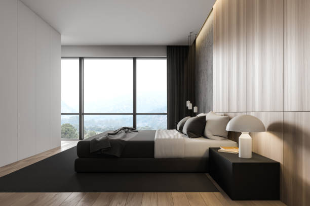 istock Wooden and white master bedroom, side view 1202487663