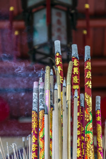 istock Burning red Chinese candles buddhist concept 1202487820