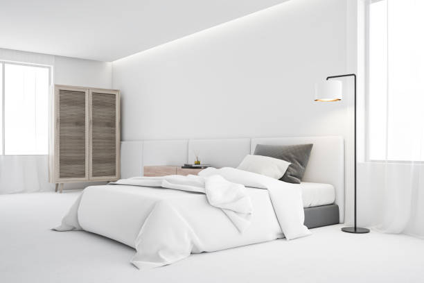 istock White bedroom corner with single bed and wardrobe 1202488751