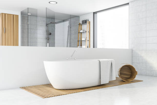 istock Spacious white tile bathroom corner with bathtub 1202489174
