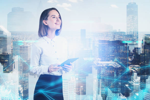 istock Cheerful woman with tablet in city, network 1202489323