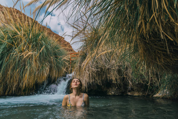 istock Woman in hot spring in Atacama desert 1202489485