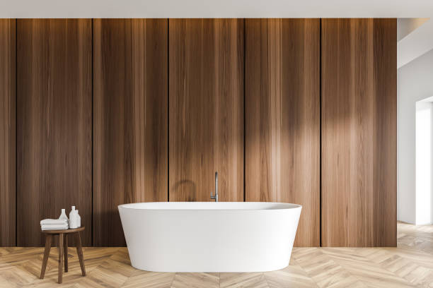 istock Dark wooden bathroom interior with tub 1202490267