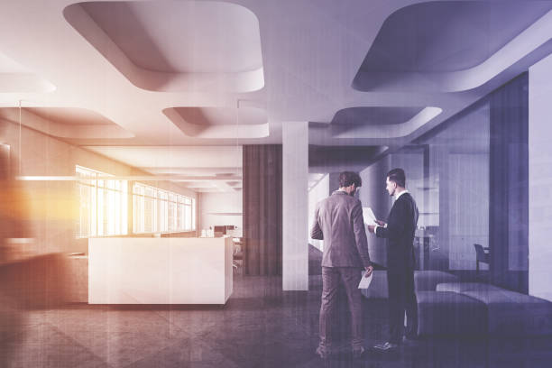 istock Business people near white office reception 1202490386