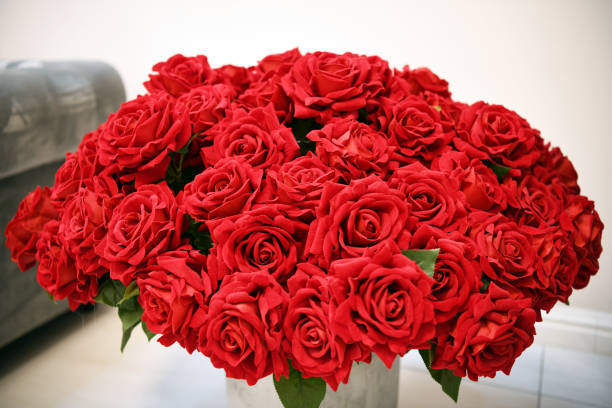 istock A beautiful bouquet of artificial red roses. 1202490926