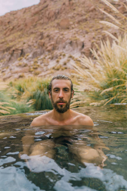 istock Man in hot spring in Atacama desert 1202491951