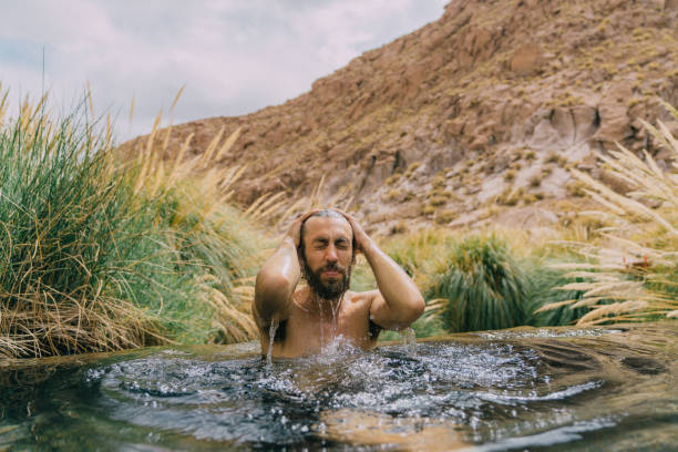 istock Man in hot spring in Atacama desert 1202493992