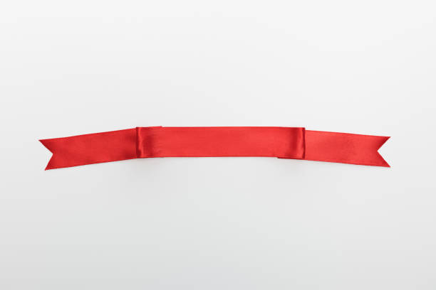 istock top view of red decorative ribbon isolated on white 1202498776