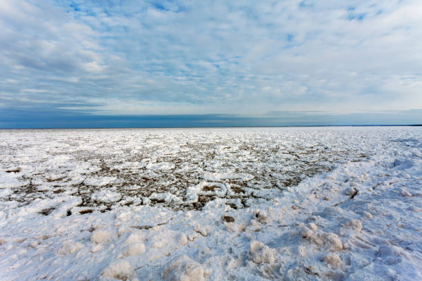 Tranquil winter landscape with ice pancake formations floating in Lake Superior, Duluth Minnesota.