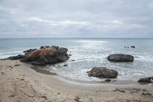 istock breaks big waves of Big Sur 1202502668