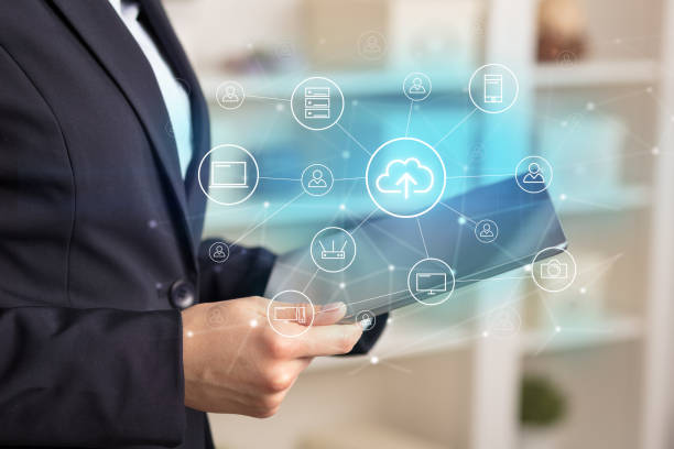 istock Business woman using tablet with cloud technology concept 1202505220